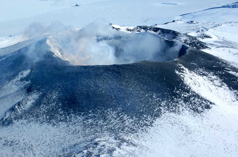 modern ice melts, this pent-up force could erupt violently, releasing not just lava—but also carbon dioxide and methane,